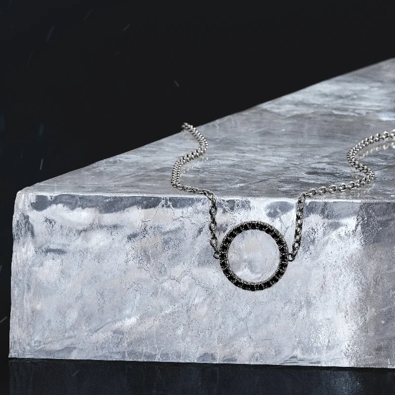 Solitaire Diamond Rings in Platinum SettingsSpiral Planetary Natural Black Diamond Alternative Pendant with a White Necklace