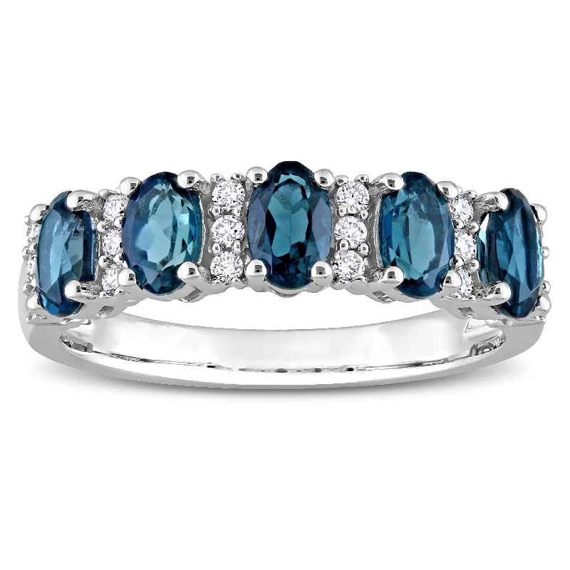 Solitaire Diamond Rings in Platinum SettingsMiadora London Blue Topaz and 1/6ct TDW Diamond Semi-Eternity Ring in 14k White Gold