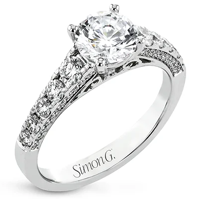 Solitaire Diamond Rings in Platinum SettingsEngagement Ring in 18k Gold with Diamonds
