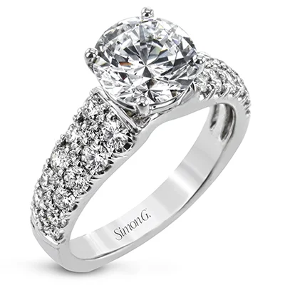 Solitaire Diamond Rings in Platinum SettingsEngagement Ring in 18k Gold with Diamonds
