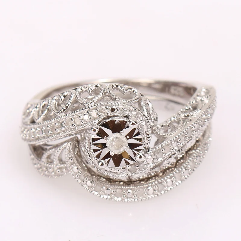 Halo - Style Diamond Rings with Smaller Accent DiamondsMiadora Sterling Silver 1/5ct TDW Diamond Bridal Ring Set
