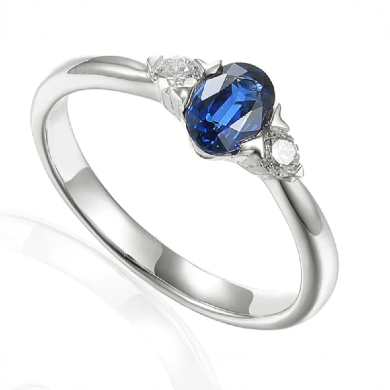 Custom - Designed Diamond Rings to Reflect Your PersonalityPlatinum 0.51ct Oval Cut Blue Sapphire And 0.13ct Round Brilliant Cut Diamond Three Stone Ring