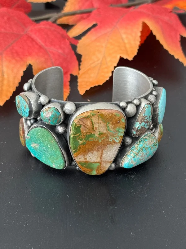 Sterling Silver Cuff Bracelets in Geometric DesignsRonald Tom Royston Turquoise & Sterling Silver Cuff Bracelet