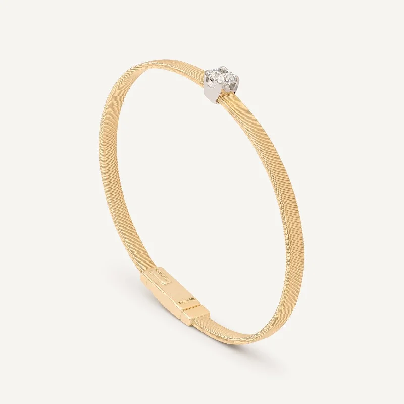 Stackable Bangle Sets for a Trendy LookMarco Bicego Masai 18k Gold Bangle with Cushion Cut Diamond