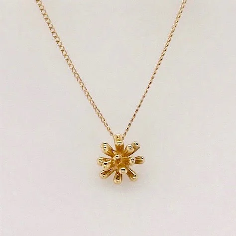 Amethyst pendants for a pop of purple color​ 14k Gold Mini Fireworks Pendant