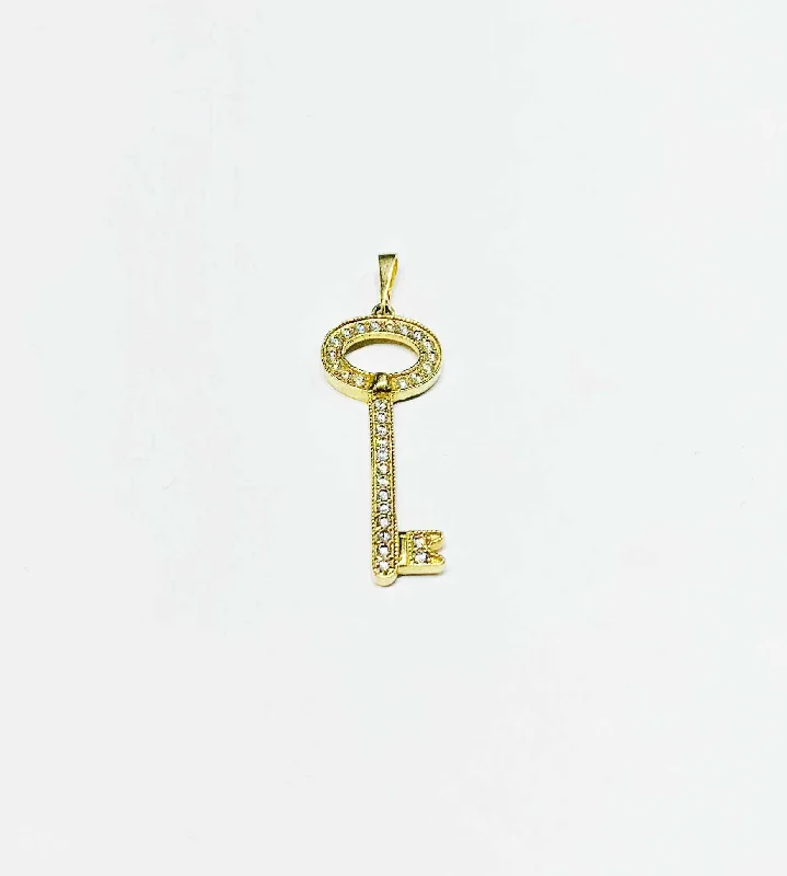 Gold pendants featuring a single large diamond for a luxurious look​ Key CZ Pendant (14K)